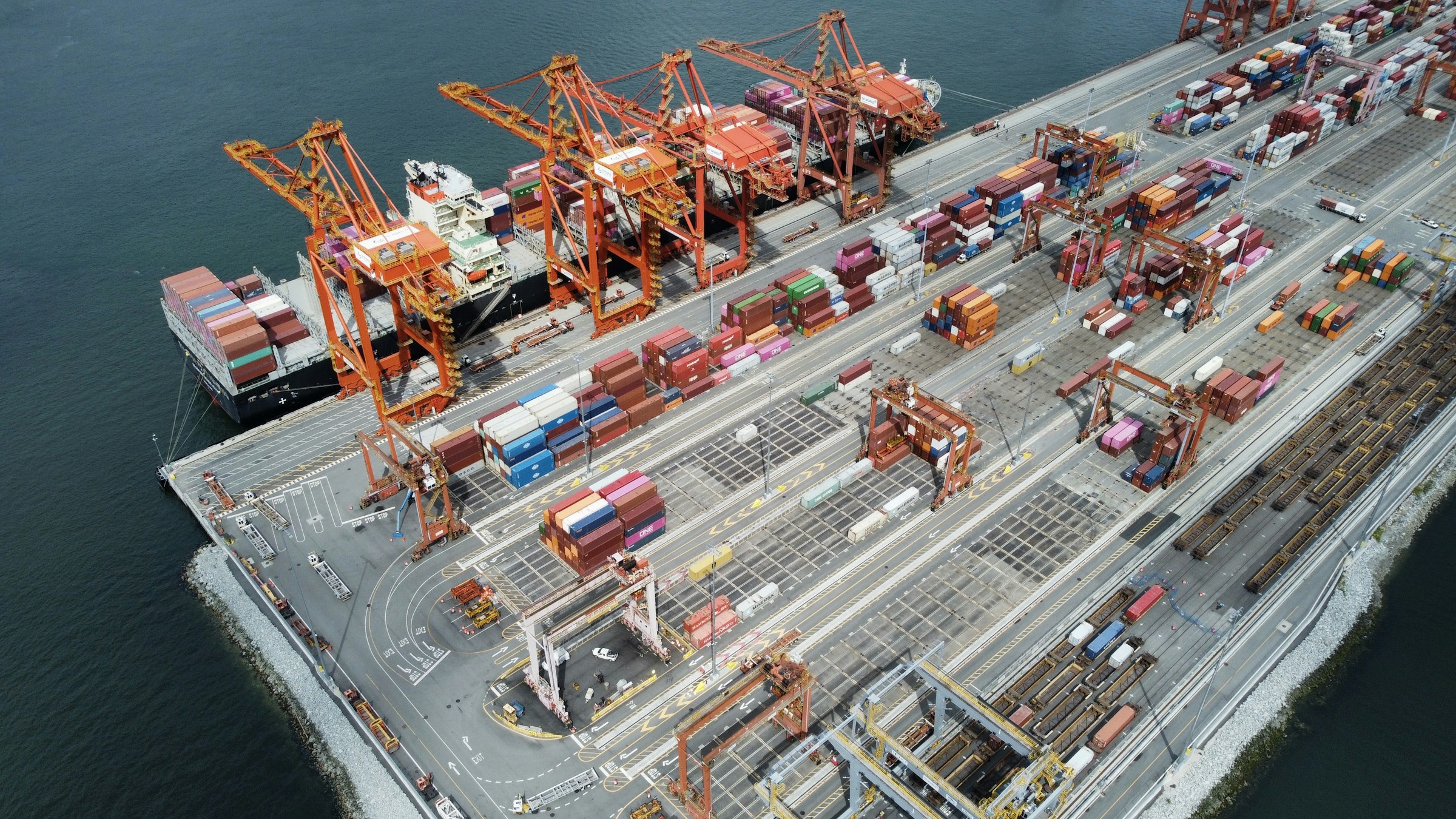 Container vessels and cranes at a cargo port